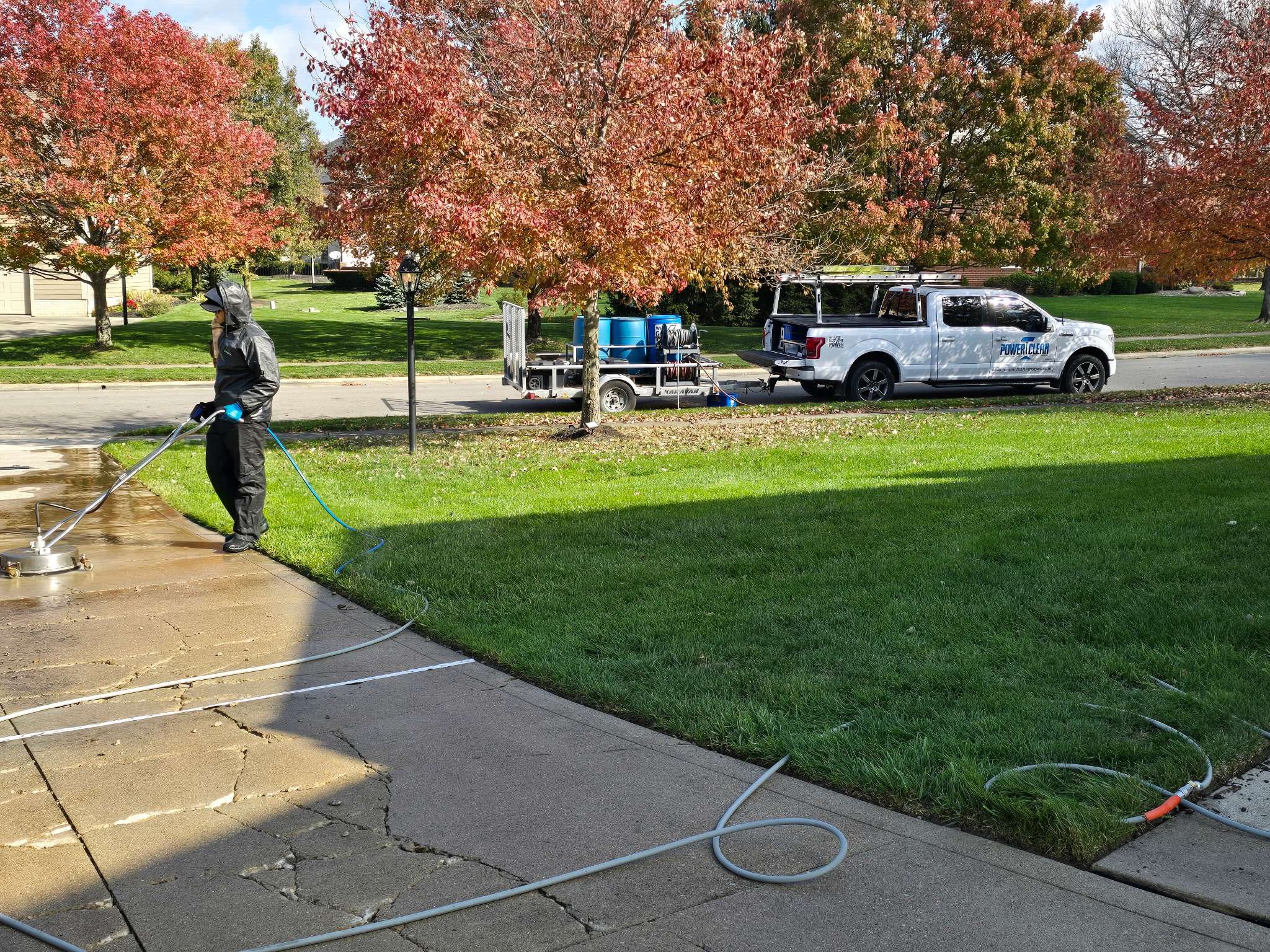 Pressure washing a concrete driveway using a surface cleaner in pickerington ohio