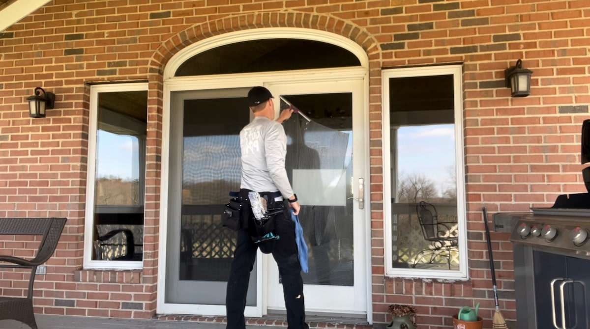 WC glass doors rear porch squeegee Milhorn Heath squoosh (1) Professional window cleaner washing the window on overcast day, Cambridge OH