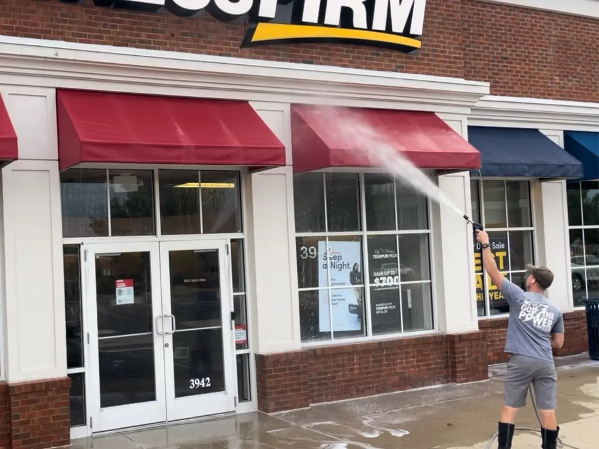 Untitled design (3) Power Clean technician power washing awnings at Mattress Firm in Central Ohio