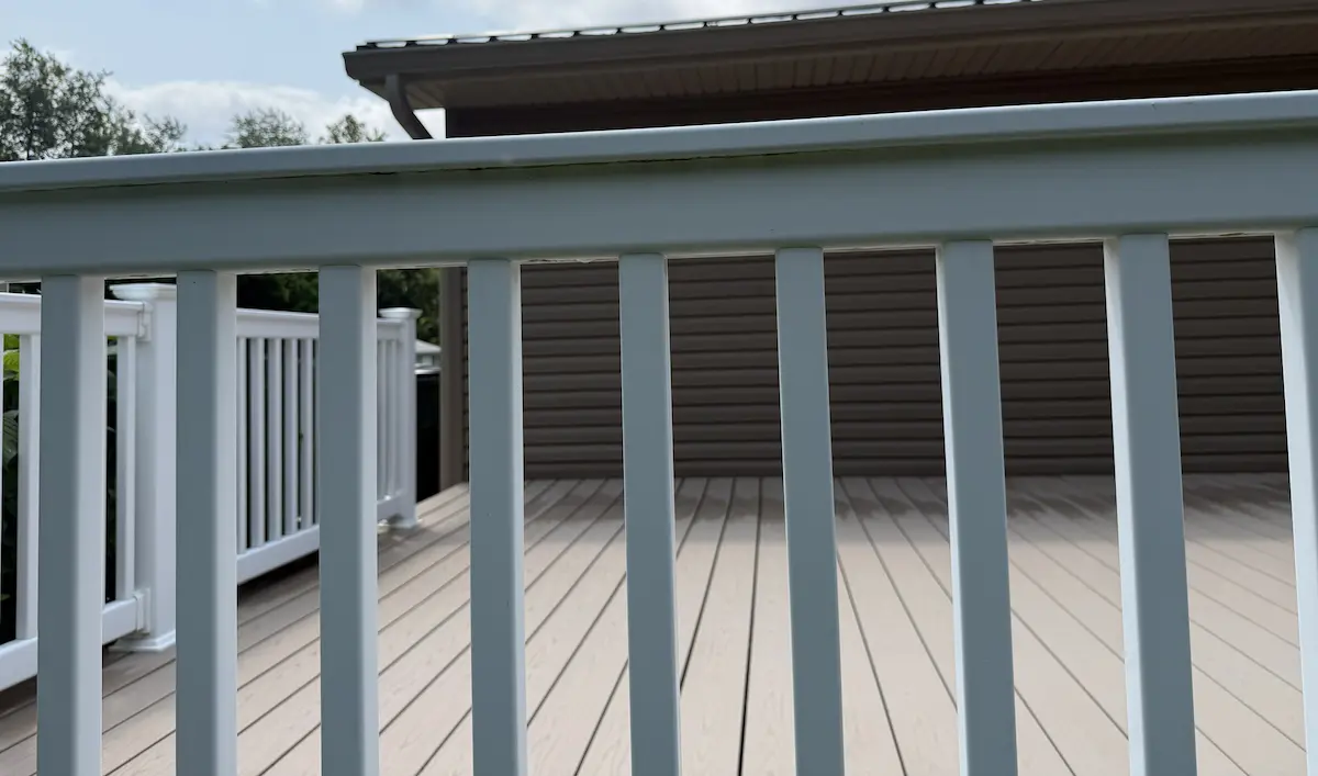 railing after being pressure washed by power clean