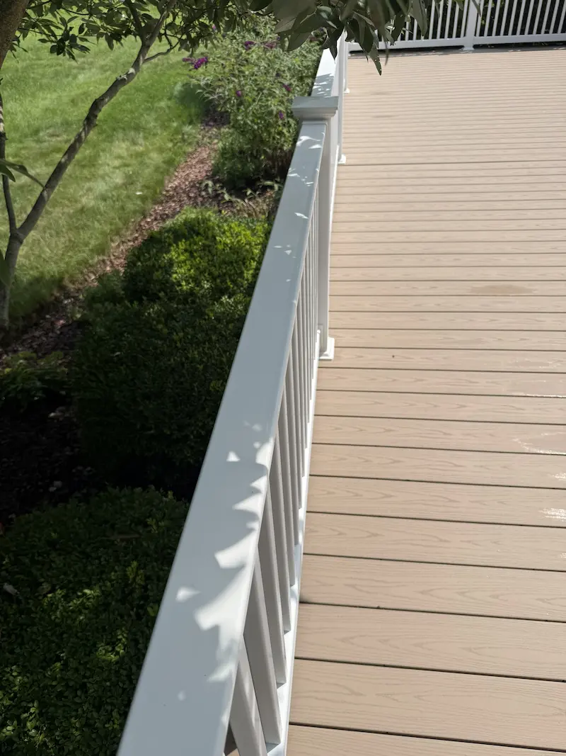 Railing after being pressure washed by power clean