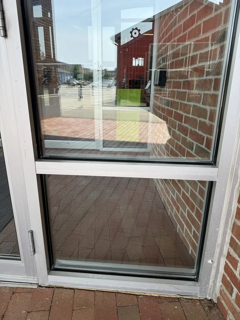 clean window after being professionally cleaned by power clean technician