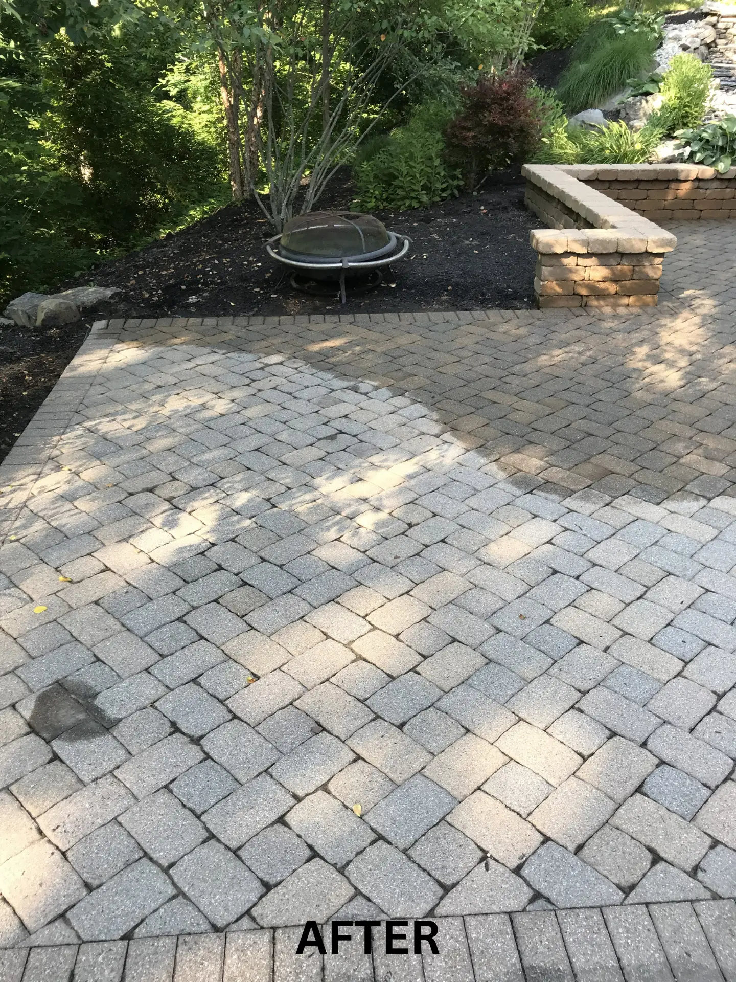 back-stone-patio-pressure-washing-after back stone patio pavers bright and clean after being pressure washed