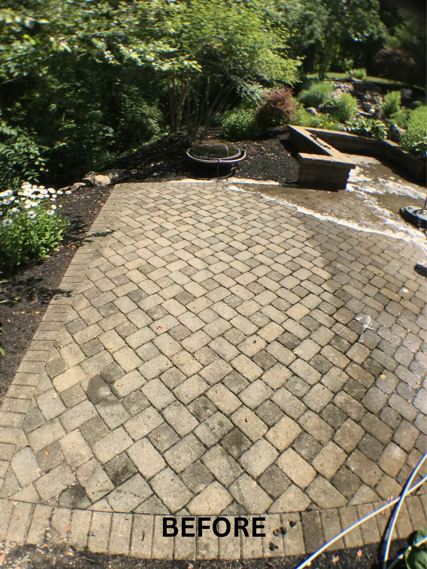 back-stone-patio-pressure-washing-before back stone patio pavers dirty and dull before being pressure washed