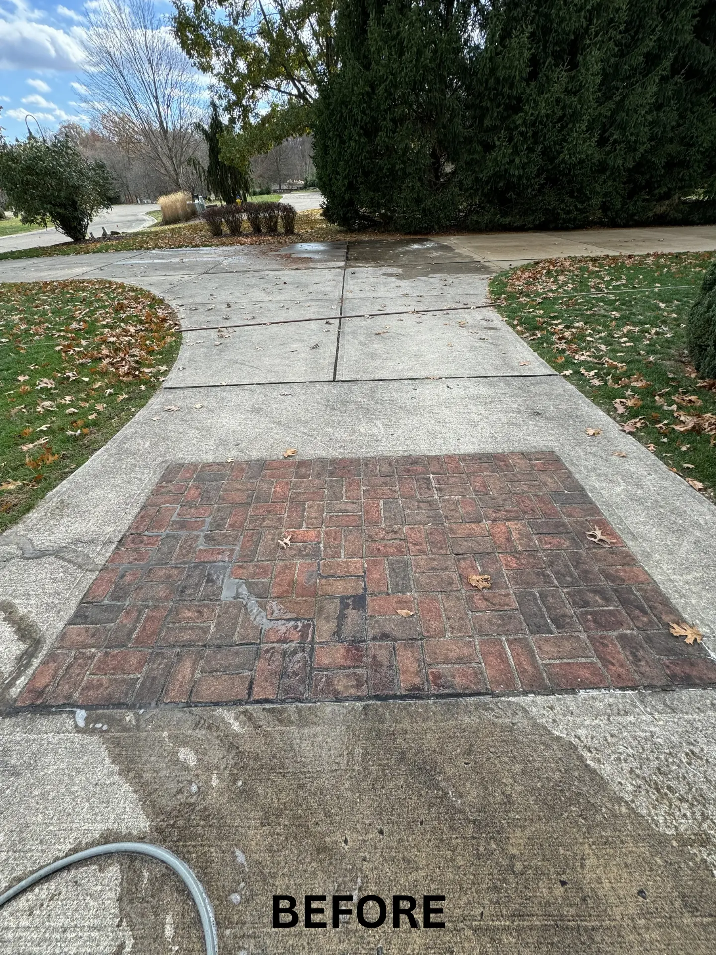 concrete-brick-dirty-pressure-washing-before concrete and brick driveway that is dirty before being pressure washed