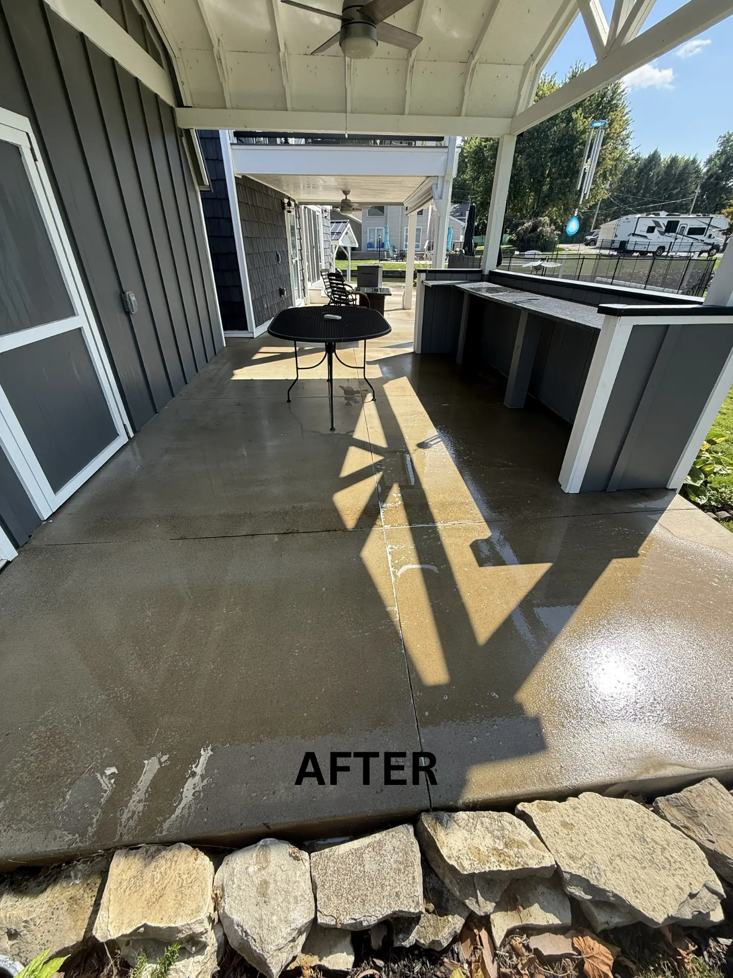 concrete back patio in heron bay thornville after being pressure washed
