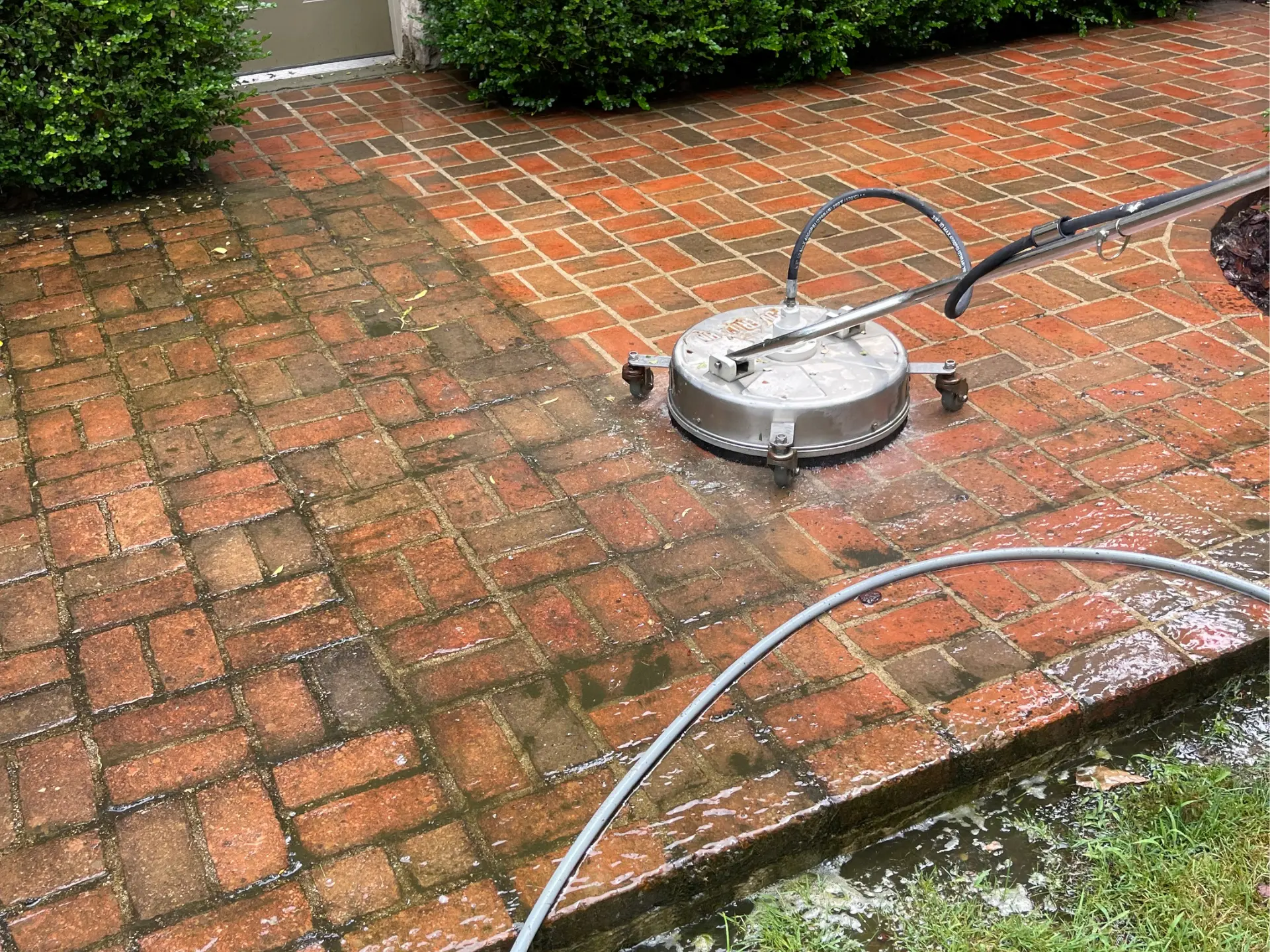 Power Clean using a surface cleaner to clean a brick walkway at a home in zanesville OH