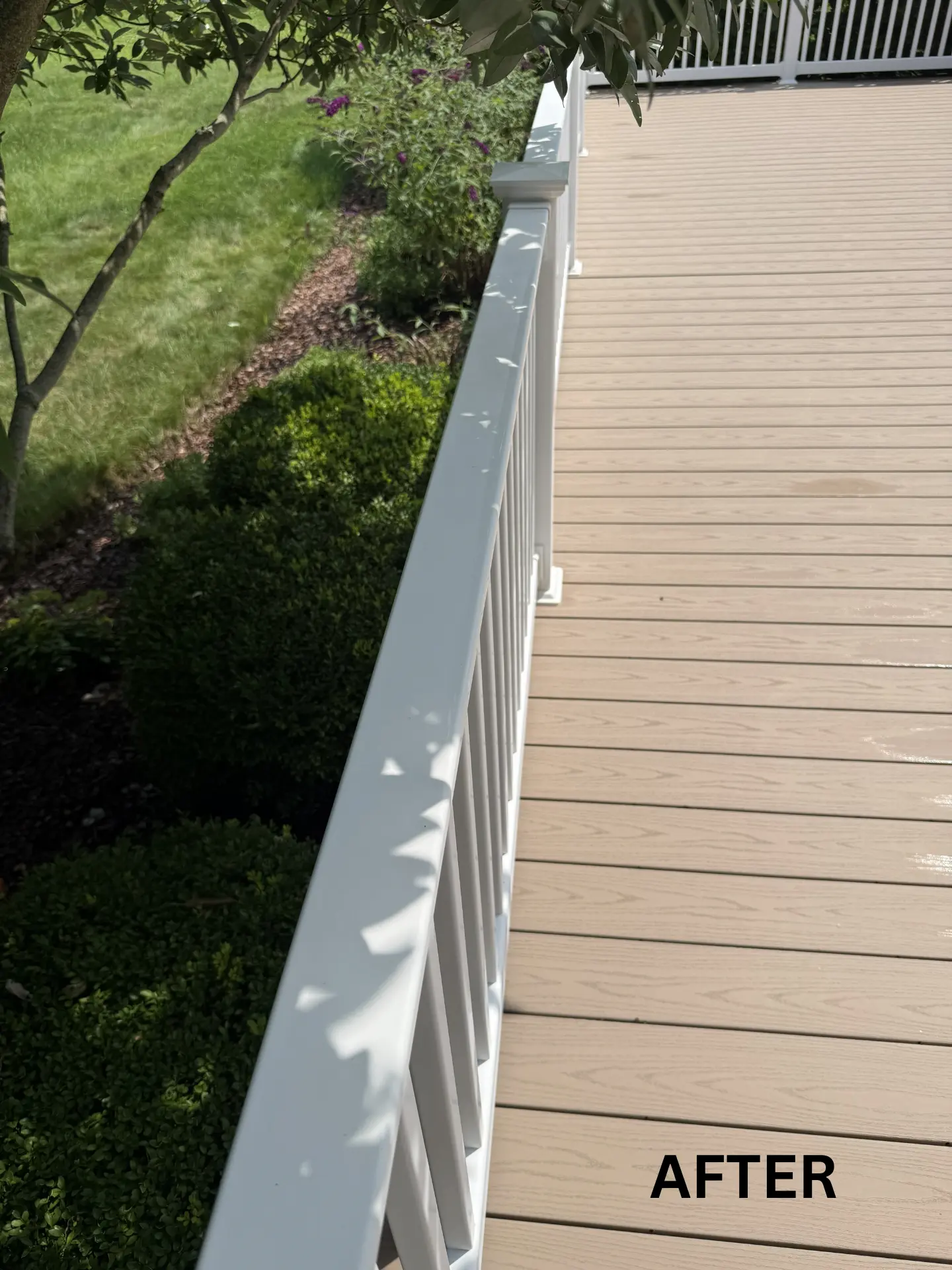 dirty handrail on porch after being pressure washed by power clean