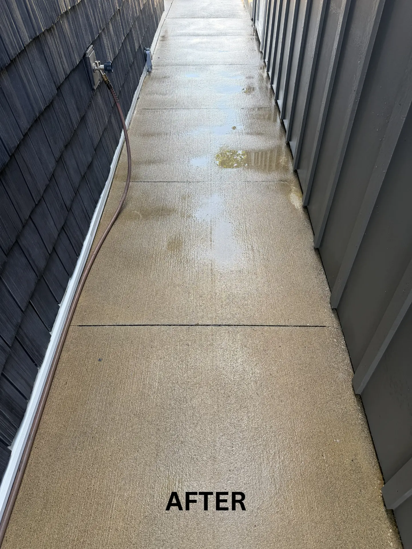 Concrete walkway in heron bay Thornville after being pressure washed by power clean