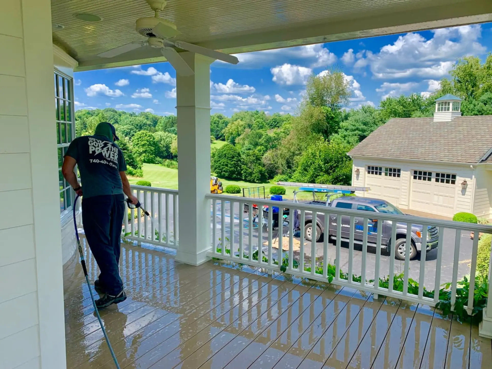 Power Clean pressure washing the upper story deck of home in Granville, OH