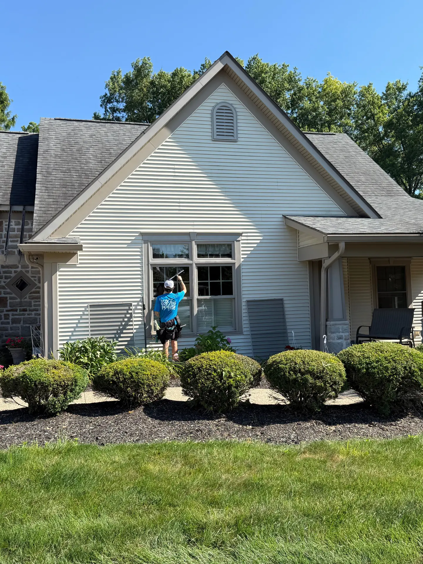 residential-window-cleaning-exterior-heath Third story window cleaning with water fed pole by Power Clean at Buckeye Lake, OH