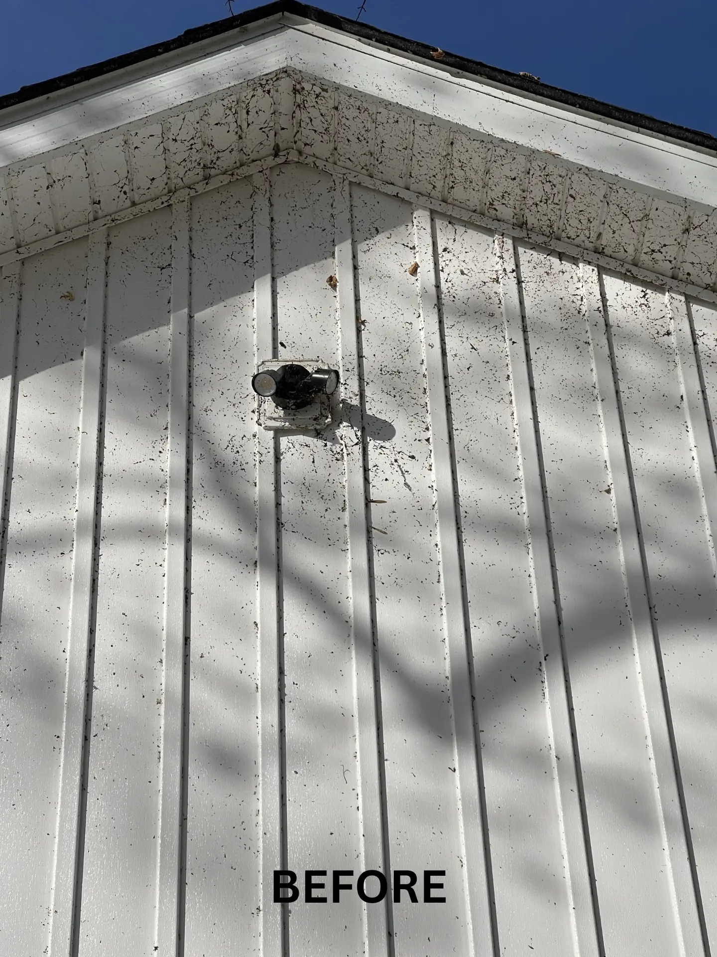 upper-peak-house-washing-before upper peak of house with dift and spiderwebs growing before pressure washing